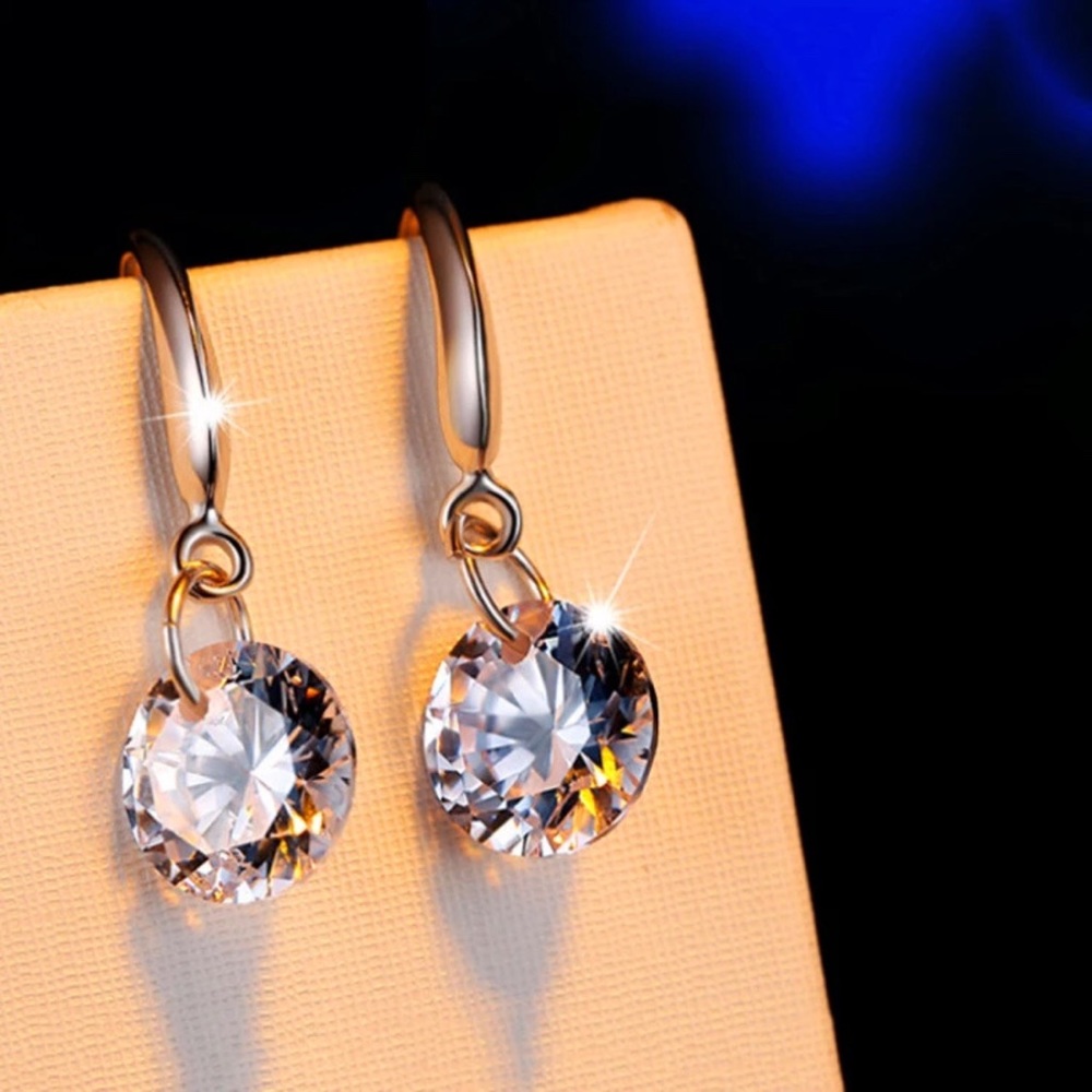 Large drilled cubic zirconia dangle Earrings
